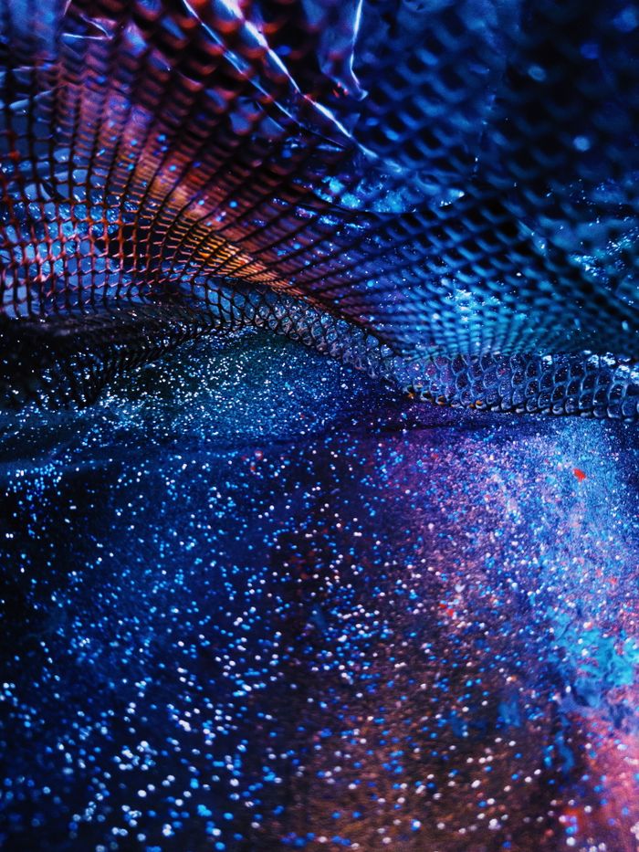 Modern glowing multicolored star night abstraction with holographic effect for creative background